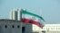 An Iranian flag flies in Iran's Bushehr nuclear power plant, during an official ceremony to kick-start works on a second reactor at the facility, November 10, 2019