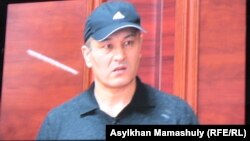 Рустам Ибрагимов, осужденный по делу об убийстве оппозиционного политика Алтынбека Сарсенбаева. Каскелен, 27 января 2014 года.