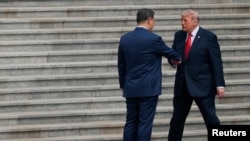 Доналд Трамп ва Си Ҷинпин, президентҳои Амрико ва Чин. 14 май, 2026.