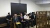 IRAQ --Members of the Russian diplomatic corps attend the trial of two Russian nationals at the Central penal Court in Baghdad, April 17, 2018