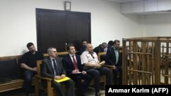 IRAQ --Members of the Russian diplomatic corps attend the trial of two Russian nationals at the Central penal Court in Baghdad, April 17, 2018