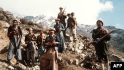 This picture taken in the early 80s shows a group of Afghan anti-Soviet resistance fighters with their primitive arms.