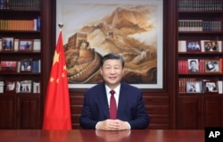 Chinese leader Xi Jinping says Taiwan joining mainland China is “inevitable” during his 2023 televised New Year’s Eve address.