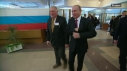 Putin Votes In Russia's Presidential Election