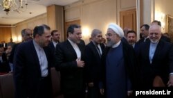 President Hassan Rouhani attends a meeting with a group of foreign ministry officials in Tehran, Iran, Sunday, July 22, 2018.