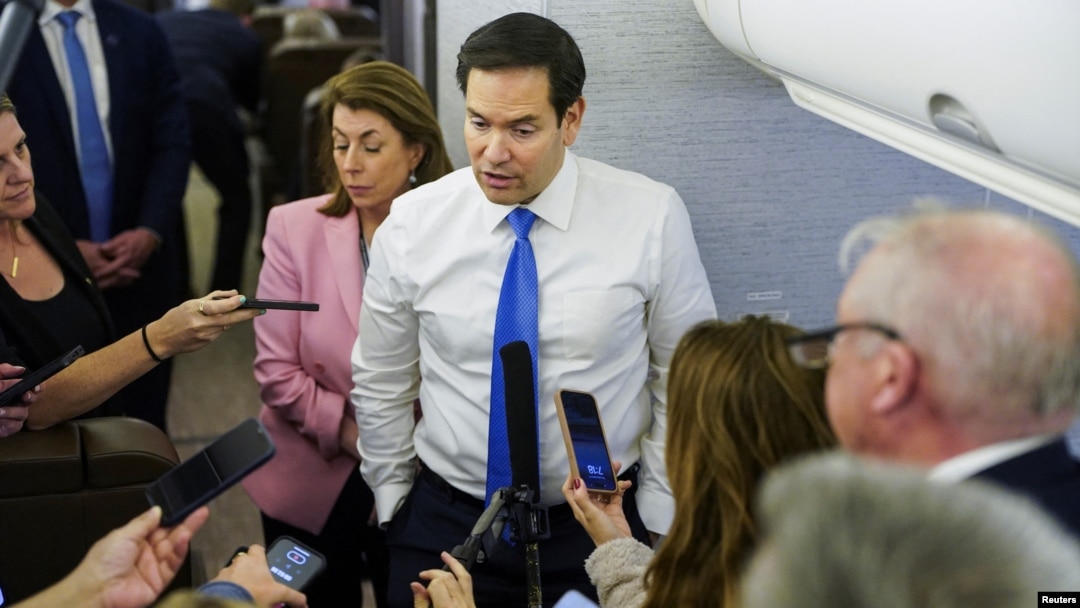 US Secretary of State Rubio speaks with reporters on his plane while flying from Suriname to Miami on March 27.