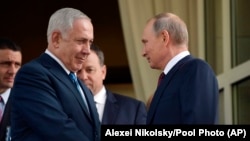 The downing of a Russian plane in Syria is a source of potential discord between Israel and Moscow. Pictured: Israeli Prime Minister Benjamin Netanyahu (left) and Russian President Vladimir Putin (file photo).