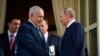 Russian President Vladimir Putin, right, and Israeli Prime Minister Benjamin Netanyahu shake hands after their talks in the Black Sea resort of Sochi, Russia, Wednesday, Aug. 23, 2017.