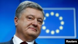 Ukrainian President Petro Poroshenko has described the introduction of visa-free travel to the EU for citizens of his country as "historic."