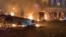 Vehicles burn in Tehran’s Kaj district amid widespread anti-government demonstrations. 