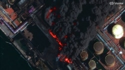 Супутникове зображення ближнього інфрачервоного діапазону показує дим, що піднімається з російського порту Усть-Луга на Балтійському морі після української атаки, Ленінградська область, 27 березня 2026 року