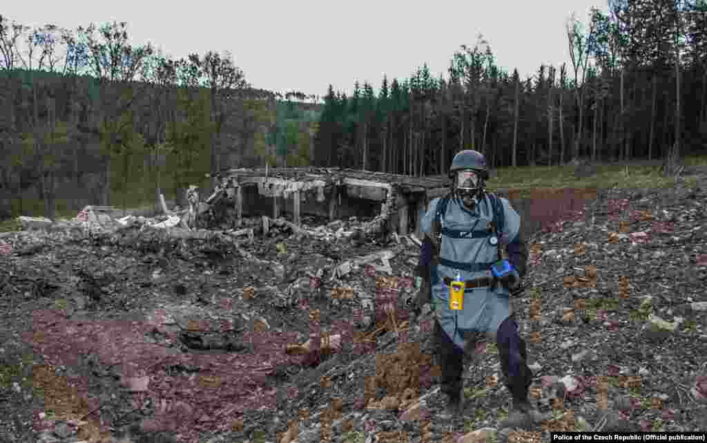 A pyrotechnician inspects the site after the deadly blast in 2014. There is &quot;reasonable suspicion regarding a role of members of Russian military intelligence&hellip;in the explosion,&quot; Czech Prime Minister Andrej Babis said on April 17.