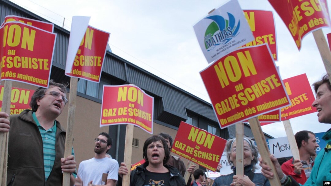 Local residents demonstrate in Saint-Hyacinthe, Canada, before a public meeting called by the shale-gas industry in September 2010.