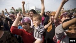 Үрімжідегі қақтығыста ұйғыр әйелдері наразылық танытып тұр. Қытай, 7 шілде 2009 жыл.