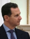 Ish-Presidenti i Sirisë, Bashar al-Assad gjatë një takimi me presidentin e Rusisë, Vladimir Putin në Moskë. Foto nga arkivi