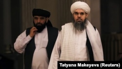 Shahabuddin Delawar (right), the Taliban's mining and petroleum minister, has been accused of nepotism after his son was appointed as the extremist group's ambassador to Uzbekistan.