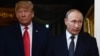 FINLAND -- US President Donald Trump (L) and Russian President Vladimir Putin arrive for a meeting in Helsinki, on July 16, 2018