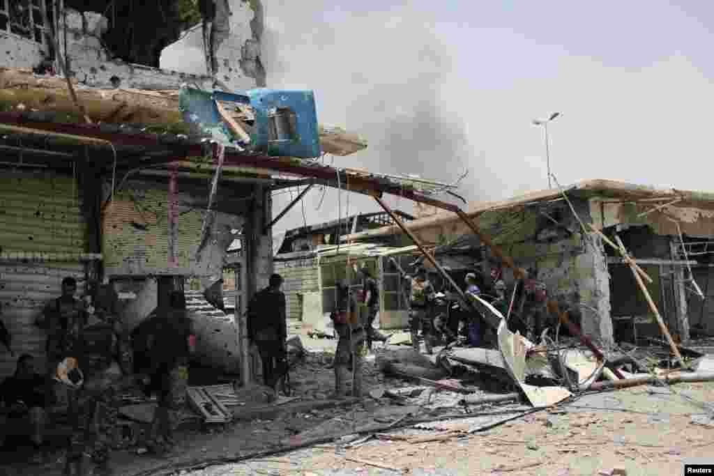 Smoke rises from an air strike during fighting with Islamic States militants in the Old City of Mosul on July 3. (Reuters/Ahmed Jadallah)