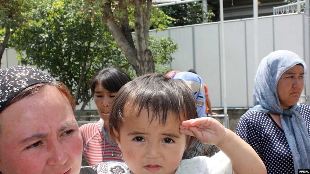 The report concluded that ethnic Uzbeks, like this mother and daughter in Osh, suffered "disproportionately."