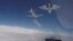 Російські Су-27 супроводжують американський бомбардувальник B-52H. Ілюстраційне фото