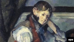 A section of a reproduction of Paul Cezanne's painting "The Boy in the Red Vest," which was stolen from a private museum in 2008.