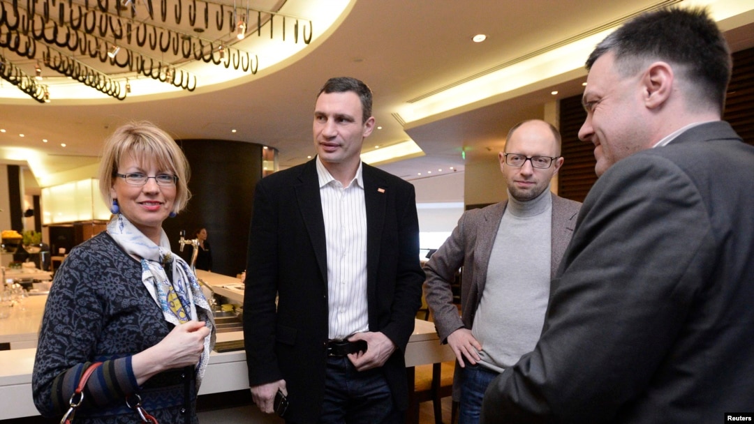EU Deputy Secretary General for the External Action Service Helga Schmid with Ukrainian opposition leaders Vitali Klitschko, Arseniy Yatsenyuk, and Oleh Tyahnybok (left to right) at a meeting in Kyiv on January 30.