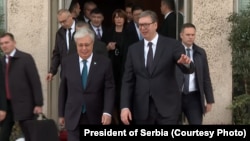 Kazakh President Qasym-Zhomart Toqaev (left) and Serbian President Aleksandar Vucic meet in Belgrade on November 19.