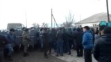 Kazakh Protesters Scuffle With Police After Killing Of Boy