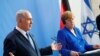 Israeli Prime Minister Benjamin Netanyahu gestures during a news conference with German Chancellor Angela Merkel in Berlin, Germany, June 4, 2018