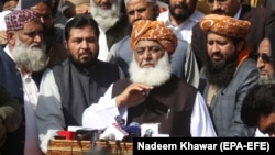Ikramur Rehman was affiliated with the party of firebrand cleric Maulana Fazlur Rehman (center), who heads an 11-party opposition alliance to topple the government.