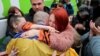 Ukraine - freed Ukrainian prisoners returning home after prisoner exchange - screen grab