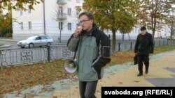 Раман Кісьляк падчас акцыі 16 кастрычніка.