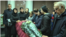 Mourners attend a farewell ceremony for Maksim Aryshev in Almaty on April 7.