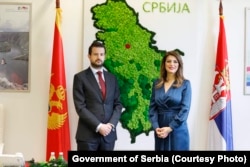 Milatovic, then-minister of economic development, and Serbian Trade Minister Tatjana Matic meet in Belgrade in June 2021.