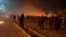 This video grab taken on January 13, 2026 from UGC images posted on social media on January 10, 2026 shows clashes in Mashhad, in northeastern Iran.