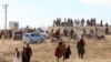 افغانستان - مردان پس از تماشای اعدام علنی یک مرد توسط طالبان در ورزشگاه فوتبال شهر گردیز، در ولایت پکتیا، در ۱۳ نومبر ۲۰۲۴، در حال ترک محل اعدام دیده می‌شوند. (عکس آرشیف)