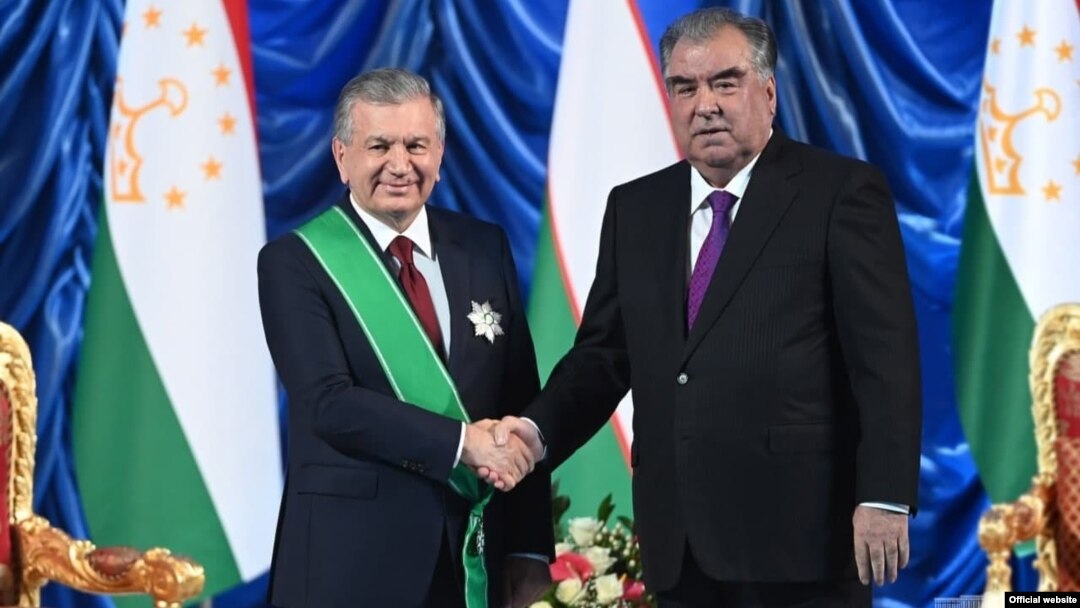 Uzbek President Shavkat Mirziyoev (left) and his Tajik counterpart, Emomali Rahmon, in Dushanbe on June 10. The new Uzbek leader has helped establish a much friendlier relationship with Tajikistan.