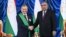 Uzbek President Shavkat Mirziyoev (left) and his Tajik counterpart, Emomali Rahmon, in Dushanbe on June 10. The new Uzbek leader has helped establish a much friendlier relationship with Tajikistan.