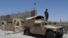 An Afghan Army soldier keeps watch at Bagram Airfield on July 2 after it was vacated by U.S. and NATO troops.