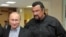 Russian President Vladimir Putin (left) with American movie actor Steven Seagal, who has just been named as a "special representative" for Russian-U.S. cultural links. (file photo)