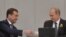 Russian President Vladimir Putin (right) with Dmitry Medvedev at a special session of the State Duma in Moscow, which confirmed Medvedev's appointment as prime minister.