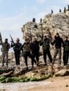 Бойцы правительственных сил, в основном из бывших отрядов "Хайят Тахрир аш-Шам", в провинции Латакия на берегу моря. 10 марта 2025 года