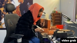 Zahra Ali, 22, builds rechargeable battery packs that help compensate for Afghanistan's unreliable power grid.