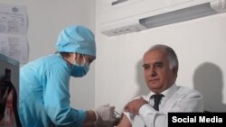 Deputy Tajik Health Minister Samariddin Aliev gets vaccinated against the coronavirus. Authorities in Tajikistan have now made coronavirus vaccinations compulsory for anyone over 18 years of age. 