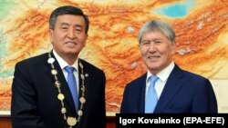 Happier times. Kyrgyz President Sooronbai Jeenbekov (left ) and former President Almazbek Atambaev at the new president's inauguration ceremony at the state residence in Bishkek.