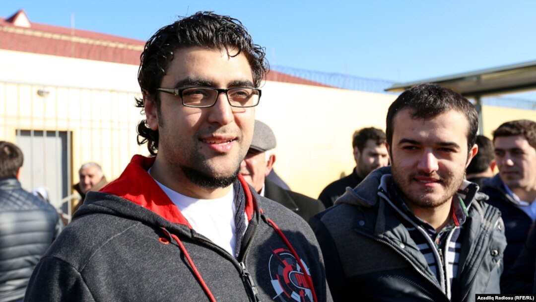 Zaur Gurbanli (left) and Uzeyir Mammadov were freed today.