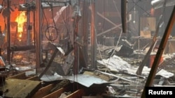 An image released by Ukraine’s Prosecutor General’s Office shows the inside of a shopping mall that was hit by a Russian drone in Kryviy Rih.