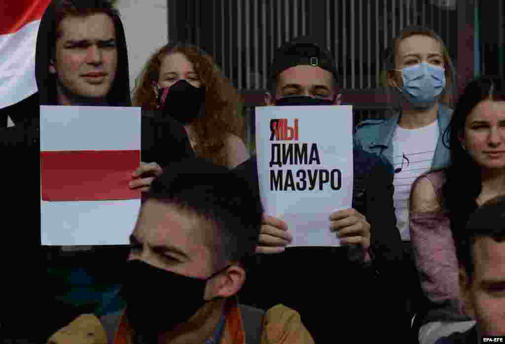 A student holds a sign that reads, &quot;We are Dima Mazuro.&quot; Mazuro made a short but powerful speech in front of his faculty on September 16, saying, &quot;There is no other trouble for the people,&quot; referring to the anger over the presidential election results that are seen as fraudulent. On September 25, the authorities ordered that Mazuro be detained for 23 days.