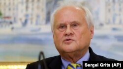 OSCE envoy Martin Sajdik speaks to the media after peace talks in Minsk on December 18.