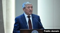Адылбек Касымалиев.